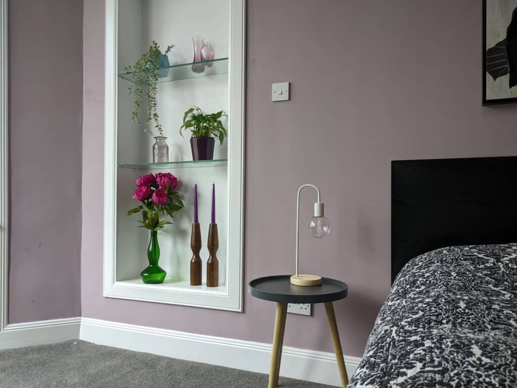 a newly-staged and decorated bedroom